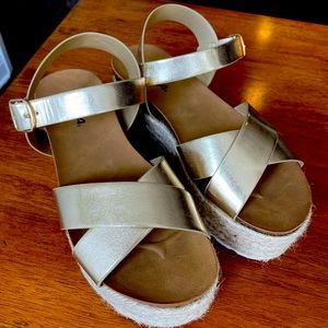 Gold platform sandals size 8.